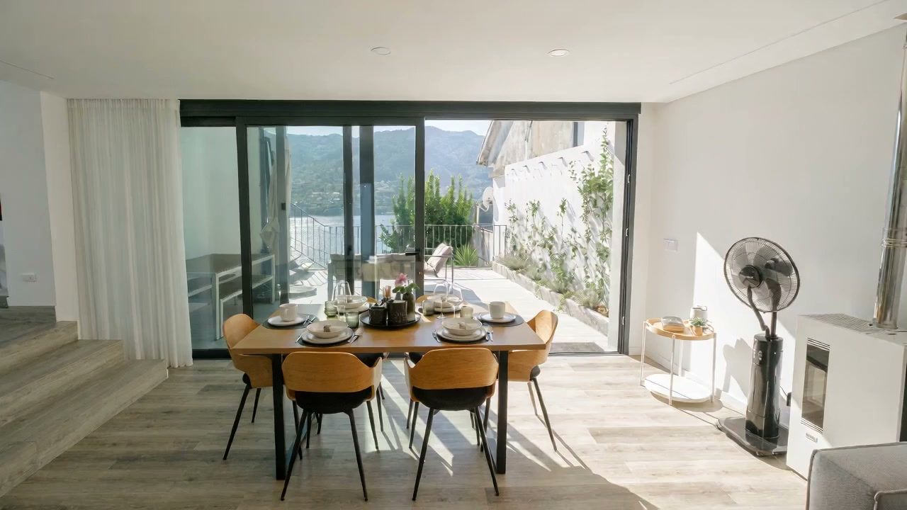 Casa Miralago dining room opening onto the terrace overlooking the Caniçada Dam