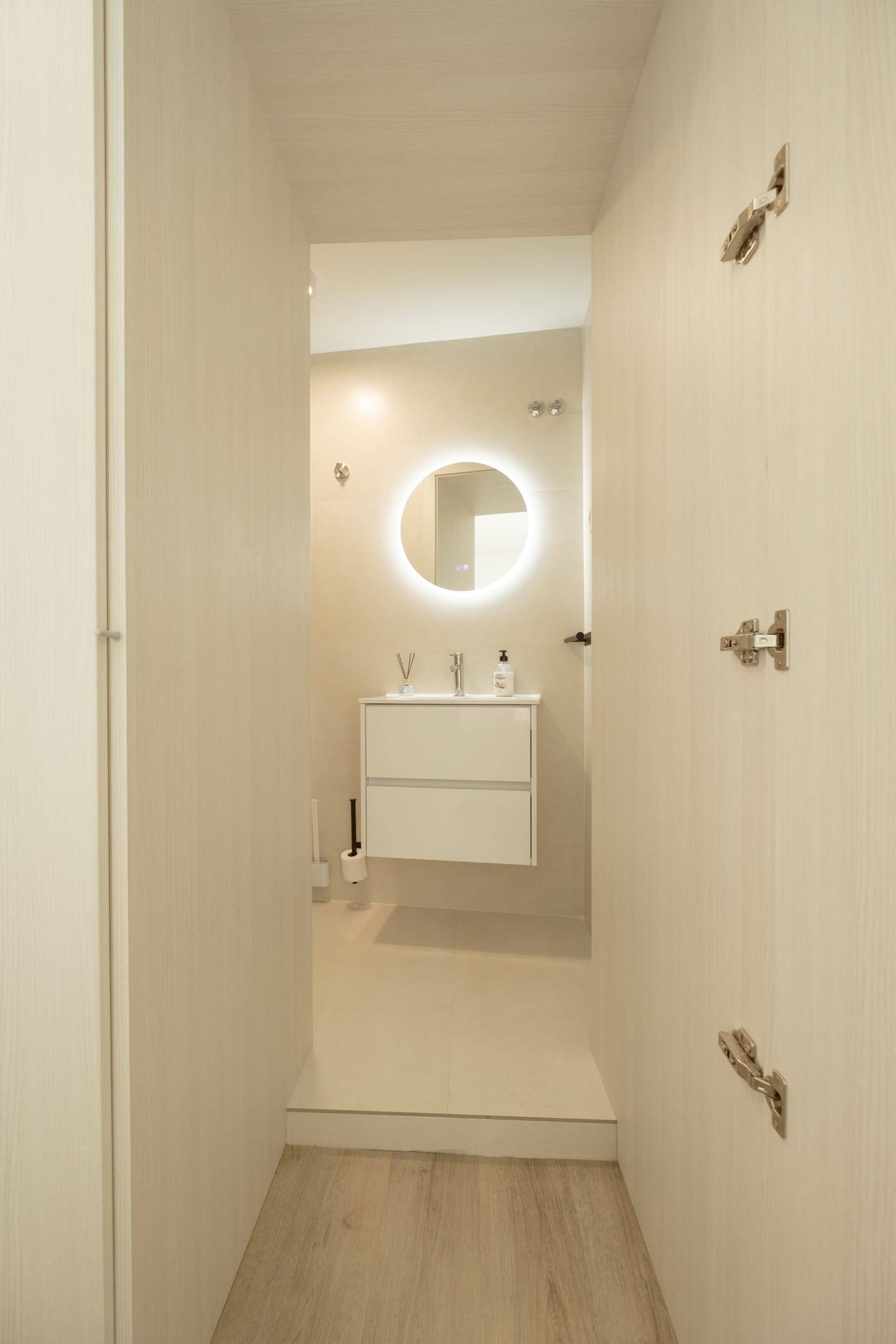 Suite hallway leading to the private bathroom